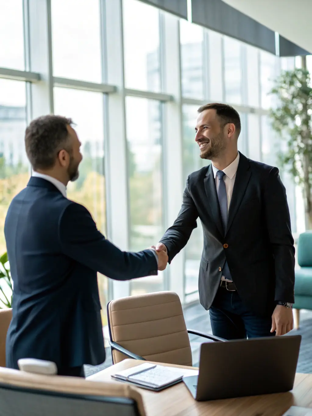 A life insurance agent successfully closing a deal with a client, showcasing the end result of using RMA Solution LLC's services.